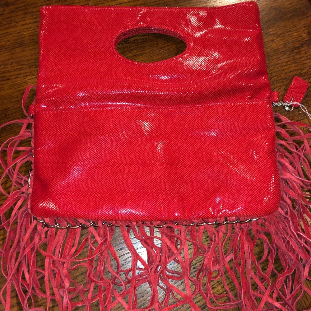 Charming charlie red fringe crossbody bag